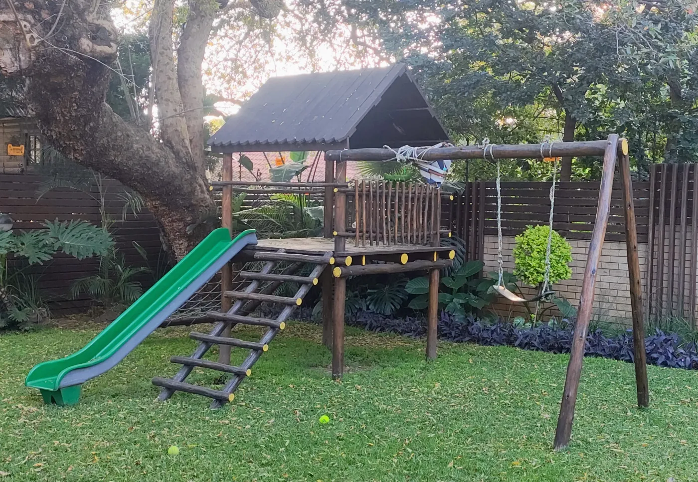 Kids Wooden Treehouse Playground with Swings & Slide